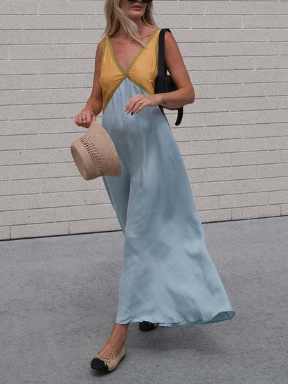 Schickes Kleid mit V-Ausschnitt und kontrastierender Farbspleißung