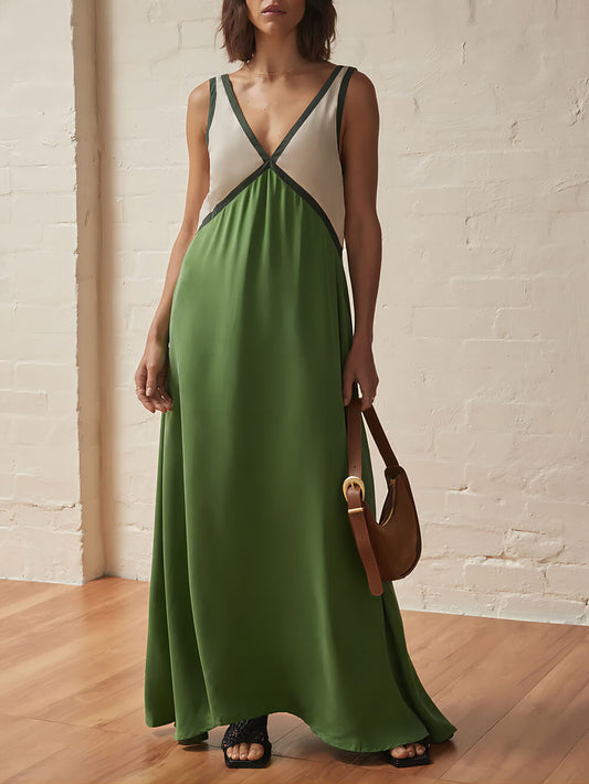 Schickes Kleid mit V-Ausschnitt und kontrastierender Farbspleißung